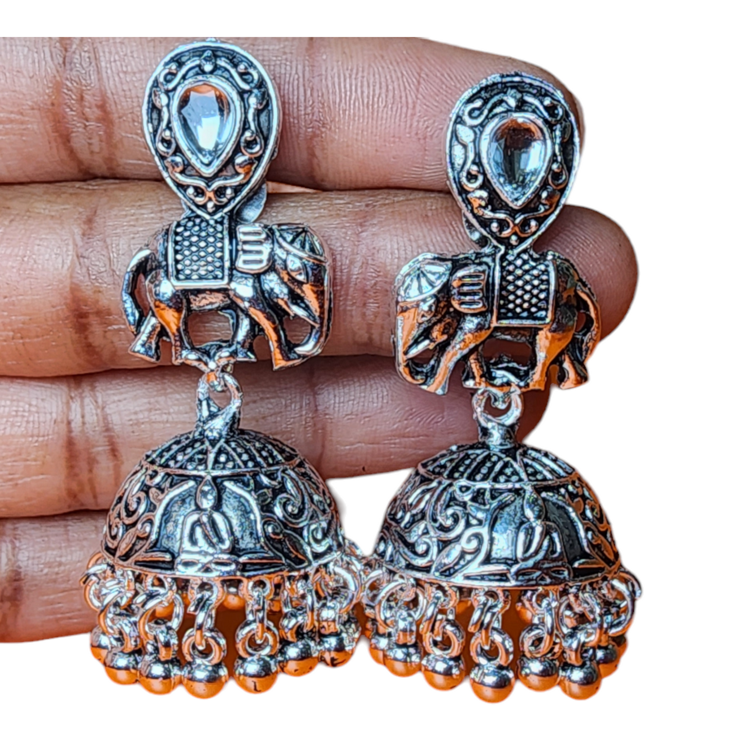 Beautiful traditional jumka earrings featuring intricate designs and vibrant colors, perfect for festive occasions.