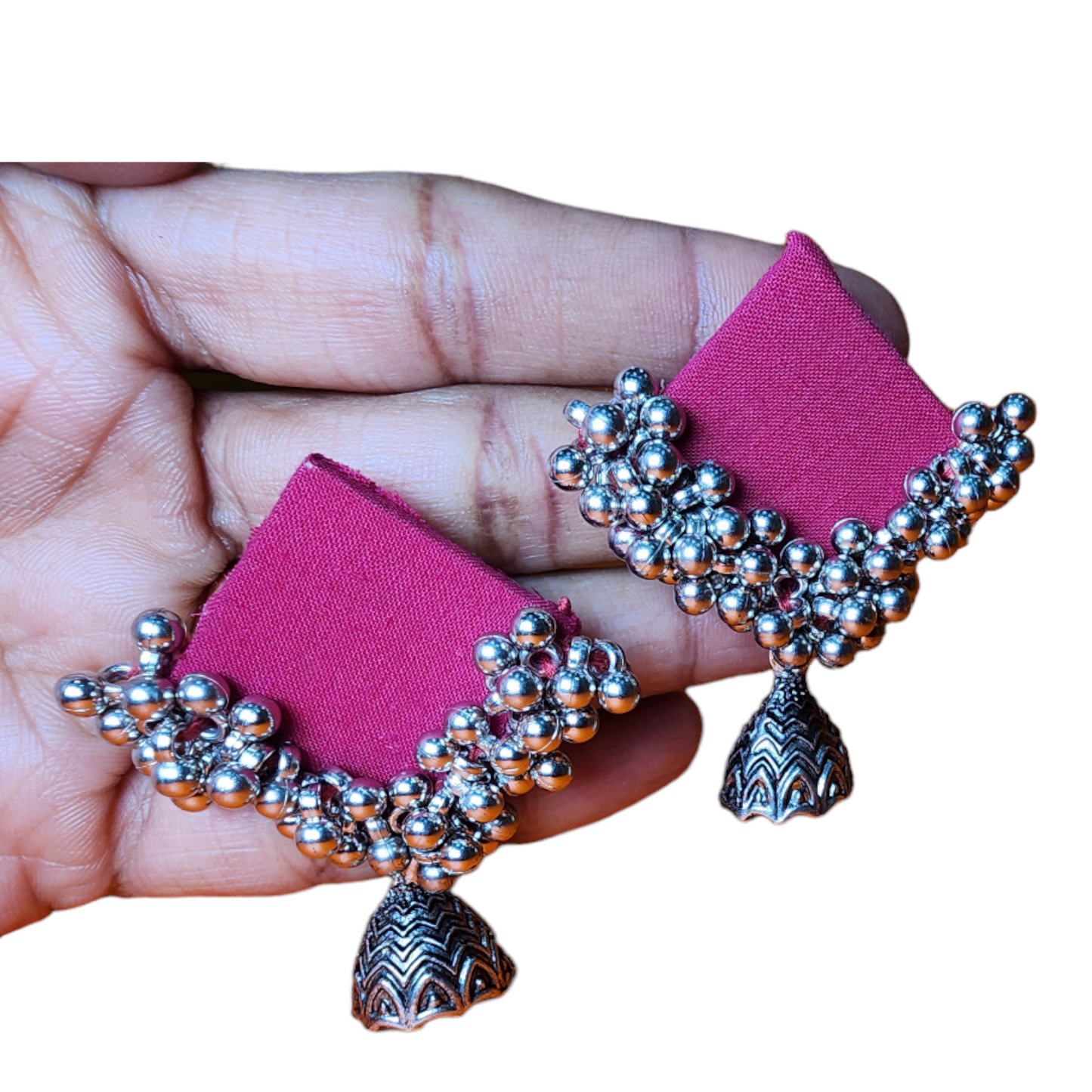 Beautiful traditional jumka earrings featuring intricate designs and vibrant colors, perfect for festive occasions.